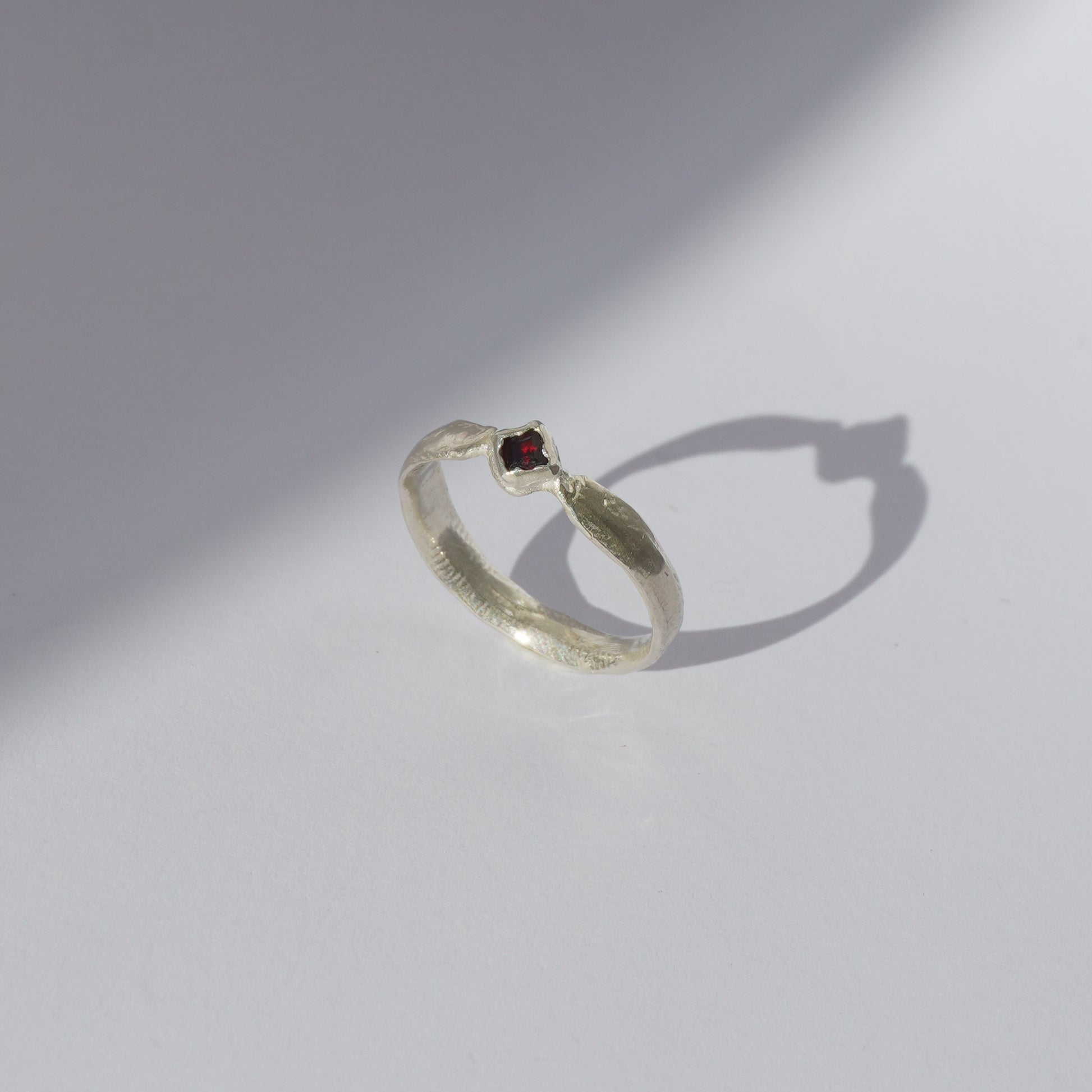 Handcrafted silver ring with organic band and customizable gemstone