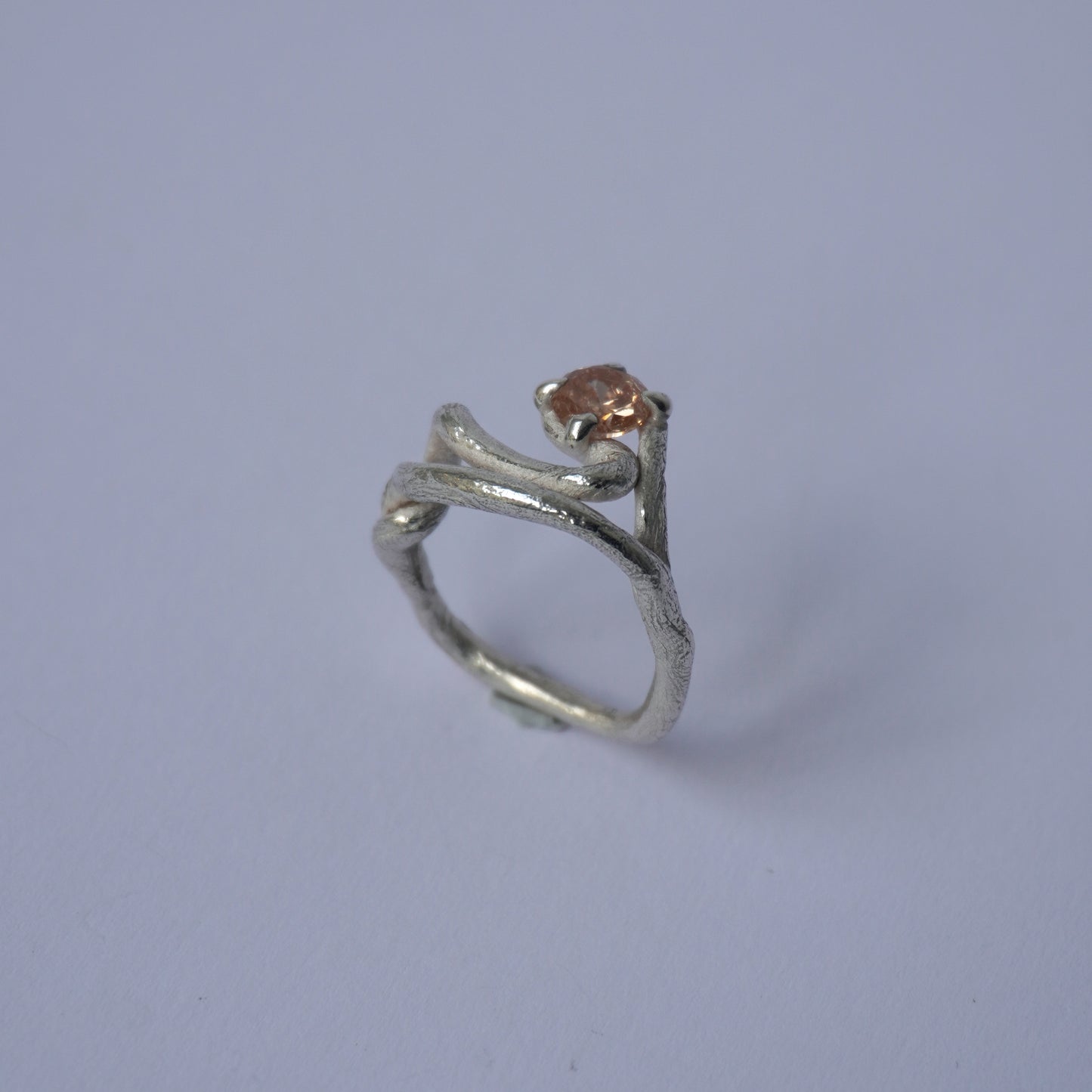 Twisted Band Silver Ring with Champagne Stone