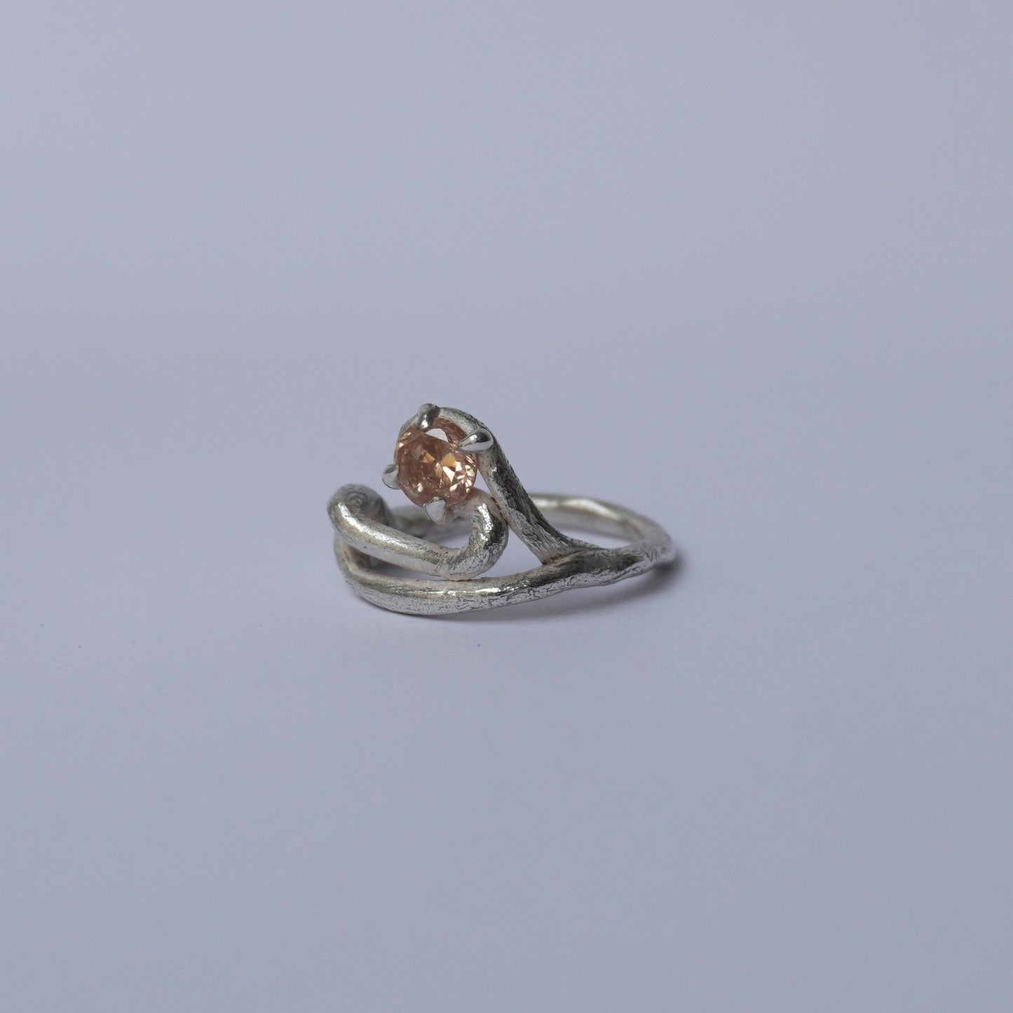Twisted Band Silver Ring with Champagne Stone