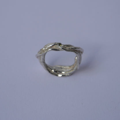 Twisted Band Silver Ring with Olive Green Cubic Zirconias