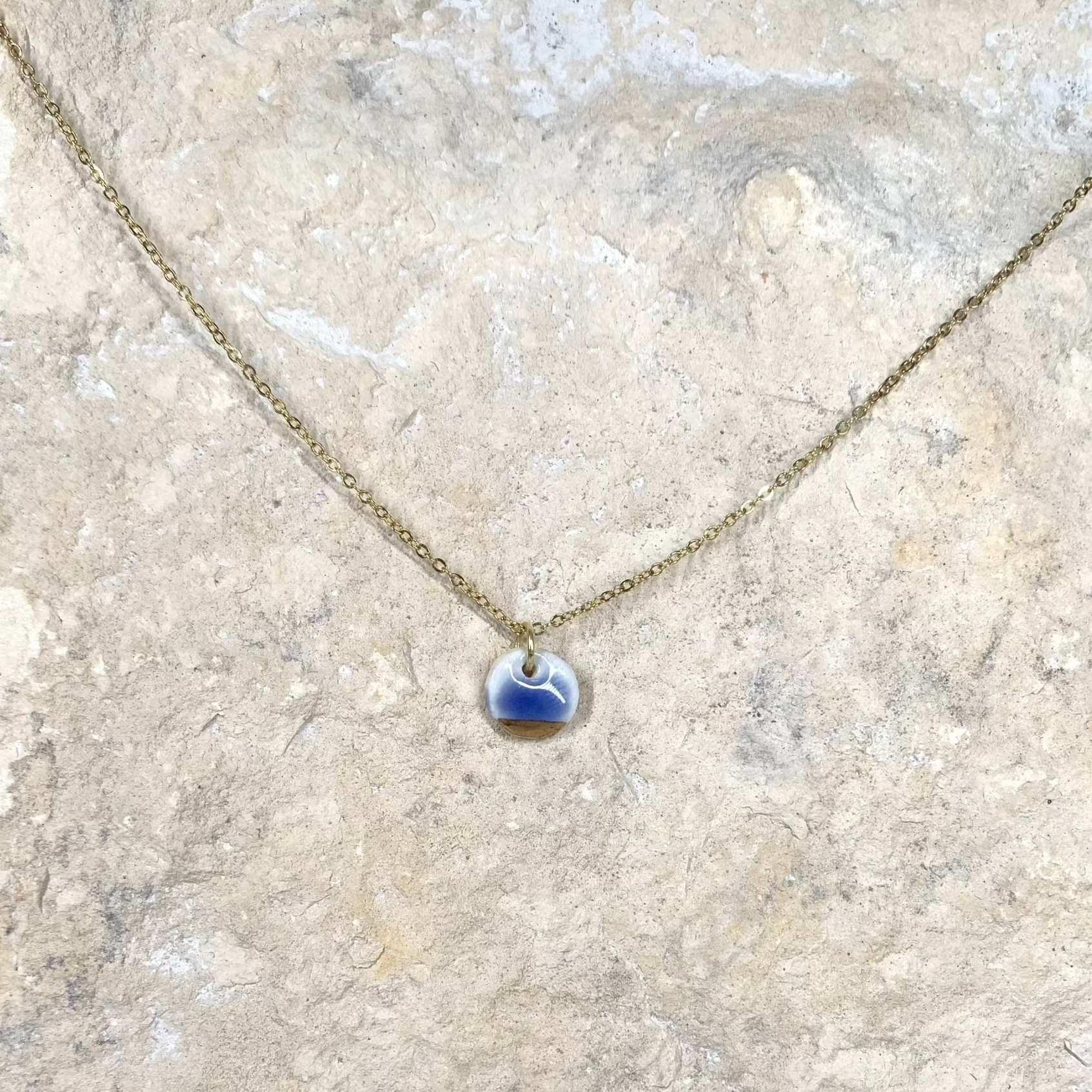 organic porcelain necklace simplicity round blue luster gold detail