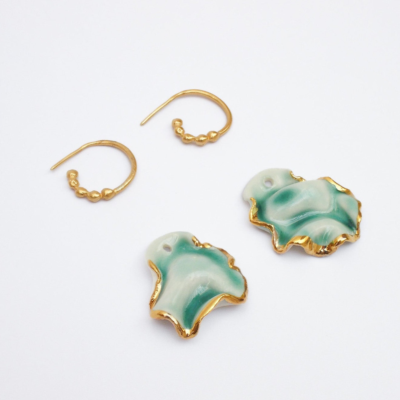 resilience hoop porcelain earrings turquoise with gold luster
