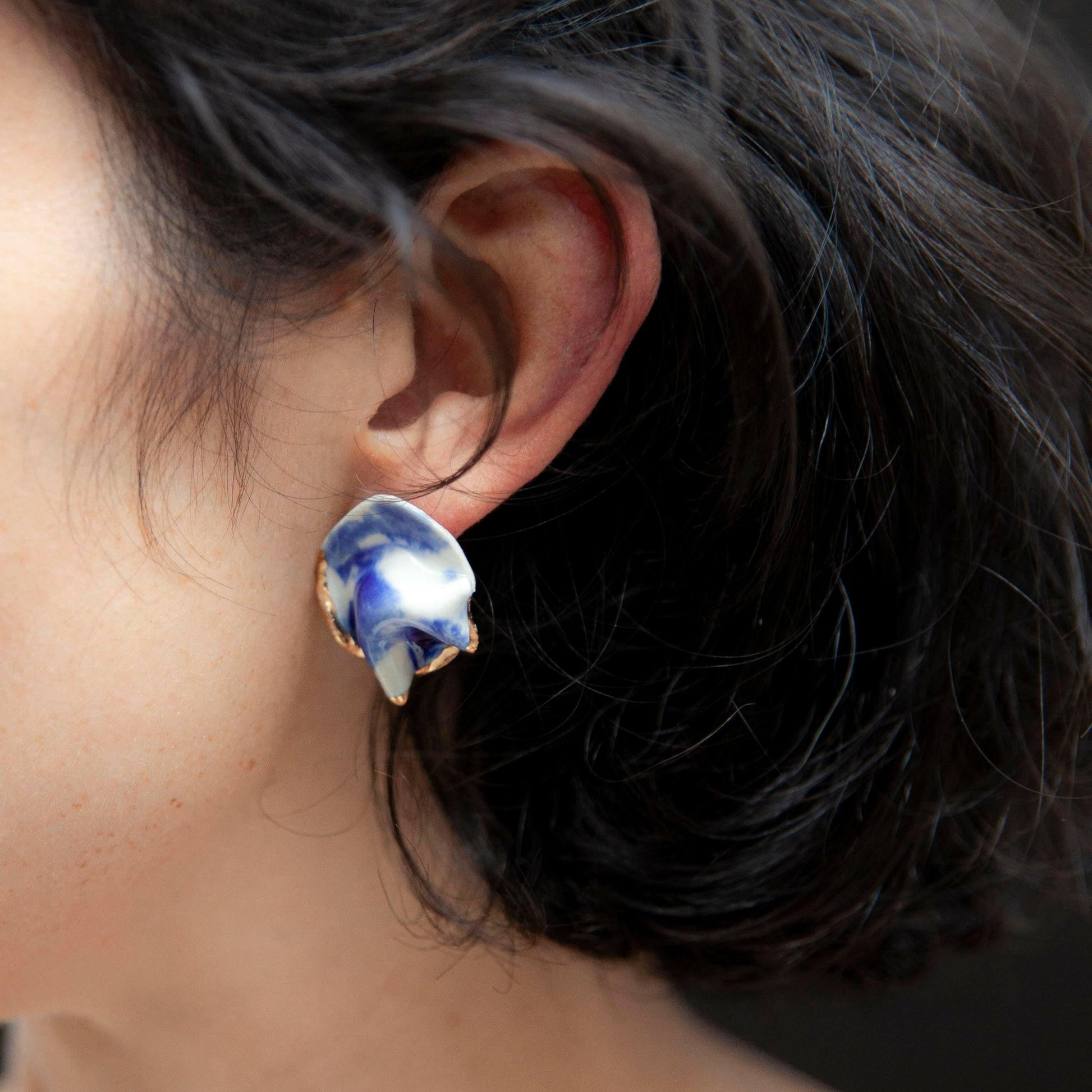 midnight calm resilience earring blue gold luster