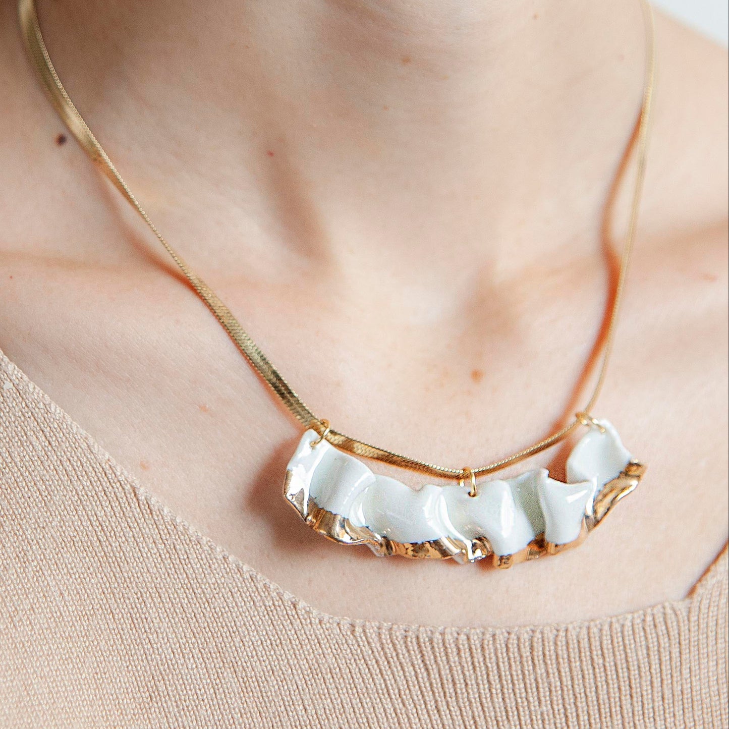 resilience porcelain necklace, white porcelain, transparent glaze, gold luster detail