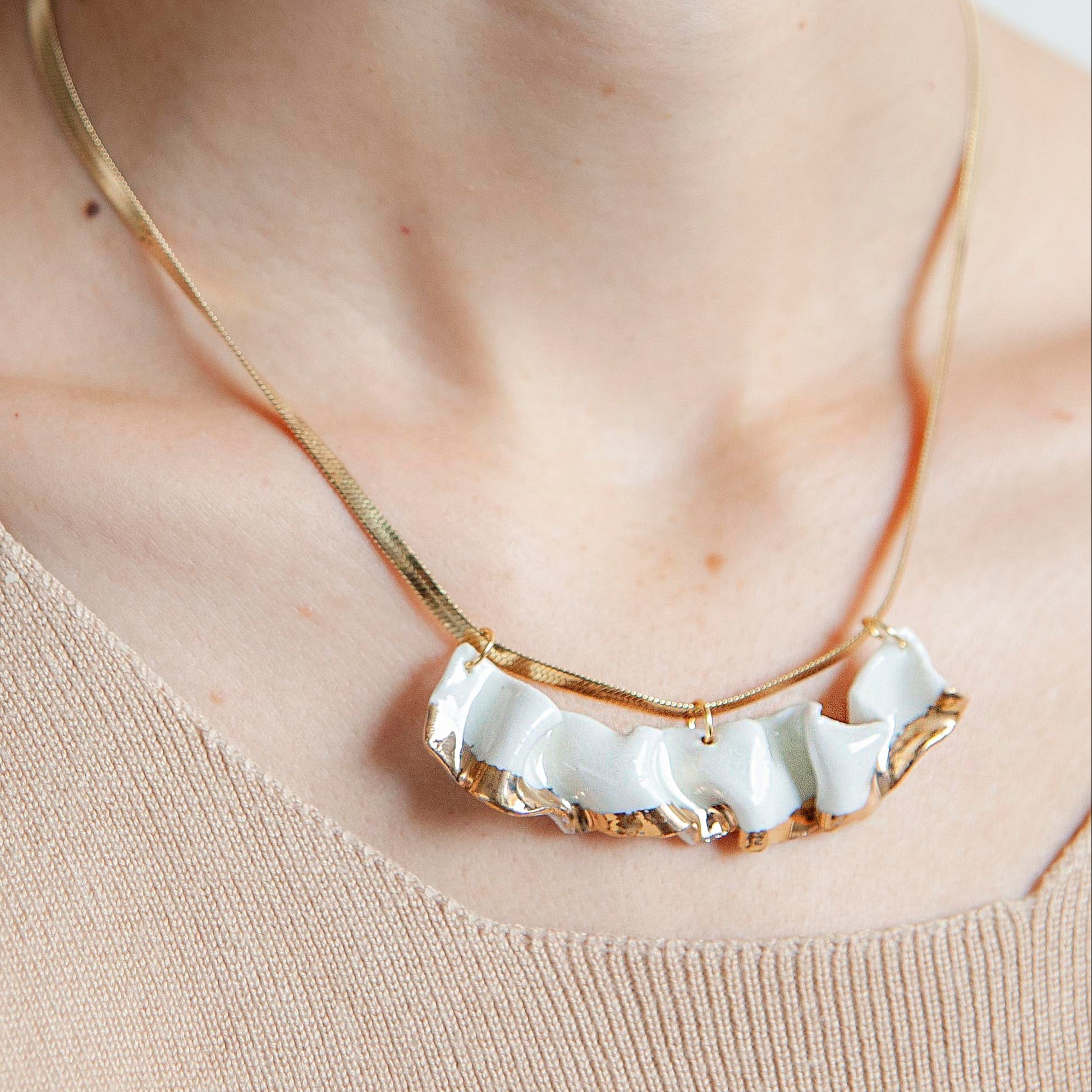 resilience porcelain necklace, white porcelain, transparent glaze, gold luster detail