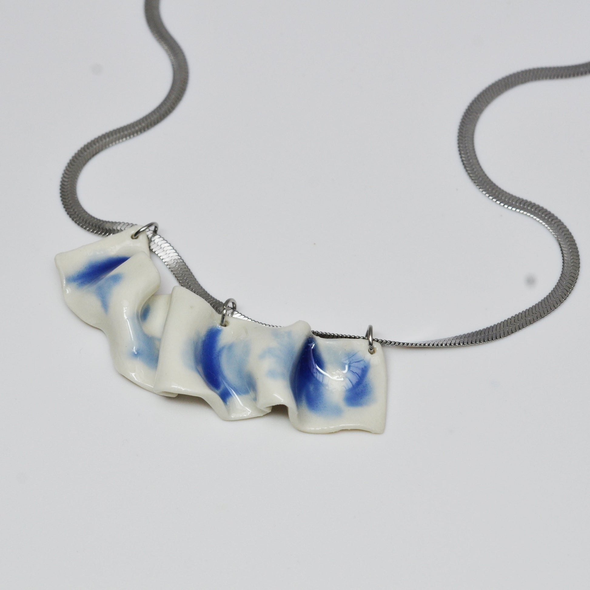resilience porcelain necklace - white porcelain, cobalt glaze