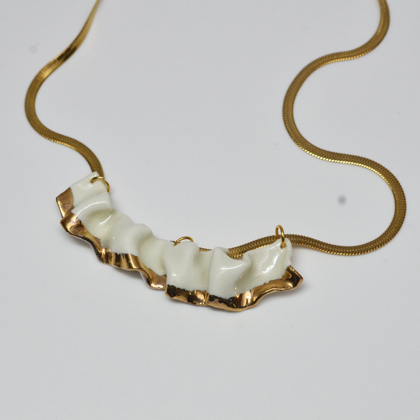 resilience porcelain necklace - White porcelain, transparent glaze, gold luster detail