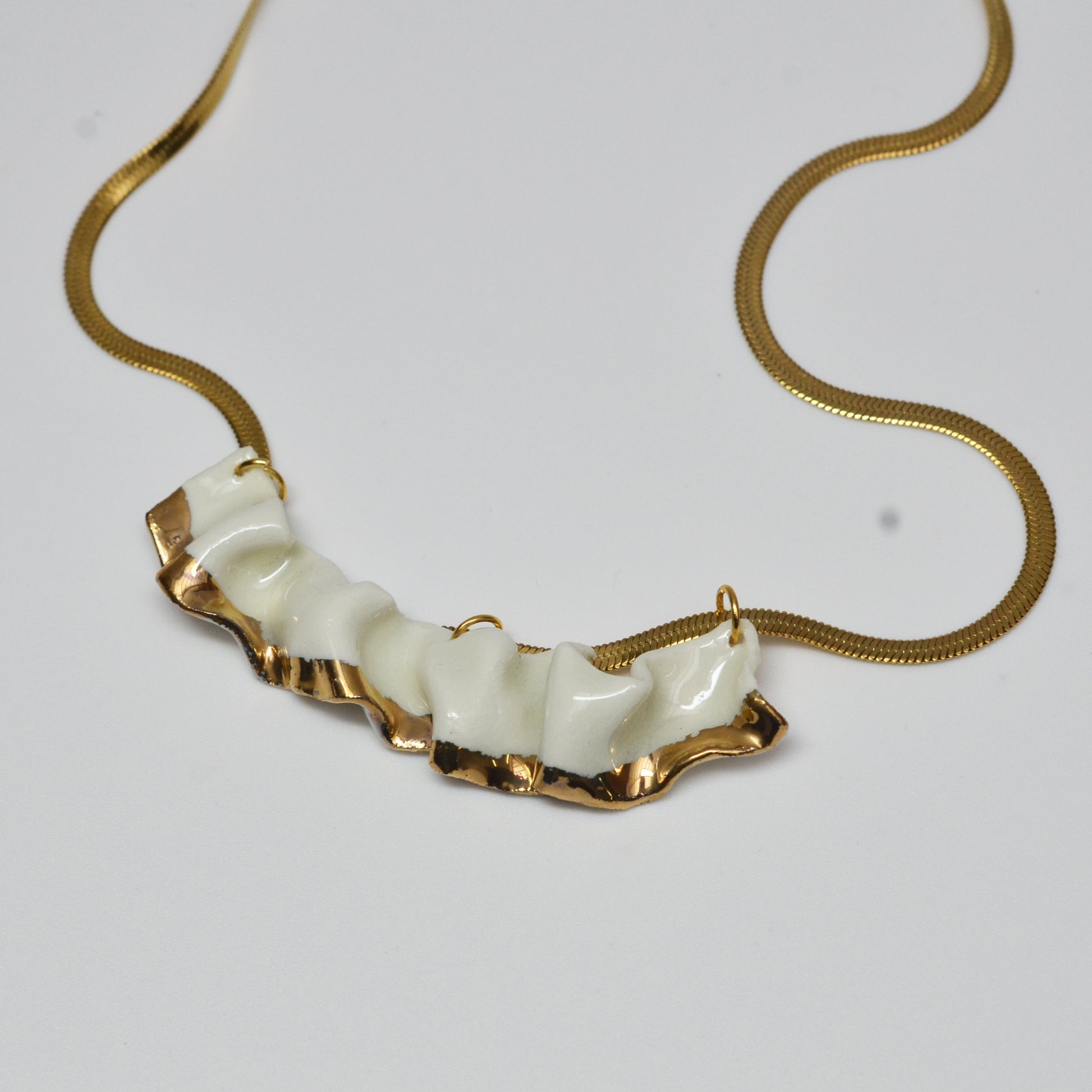resilience porcelain necklace - White porcelain, transparent glaze, gold luster detail